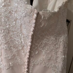 Beautiful wedding dress size 18 altered to 16 wore for 1 hour and changed!